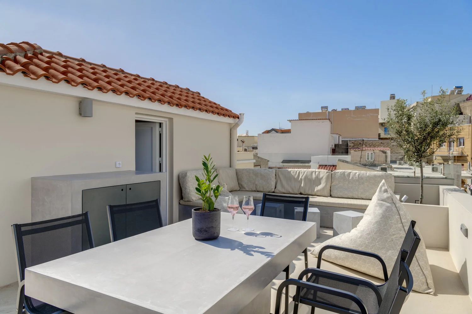 Wine and a set table on the upper terrace