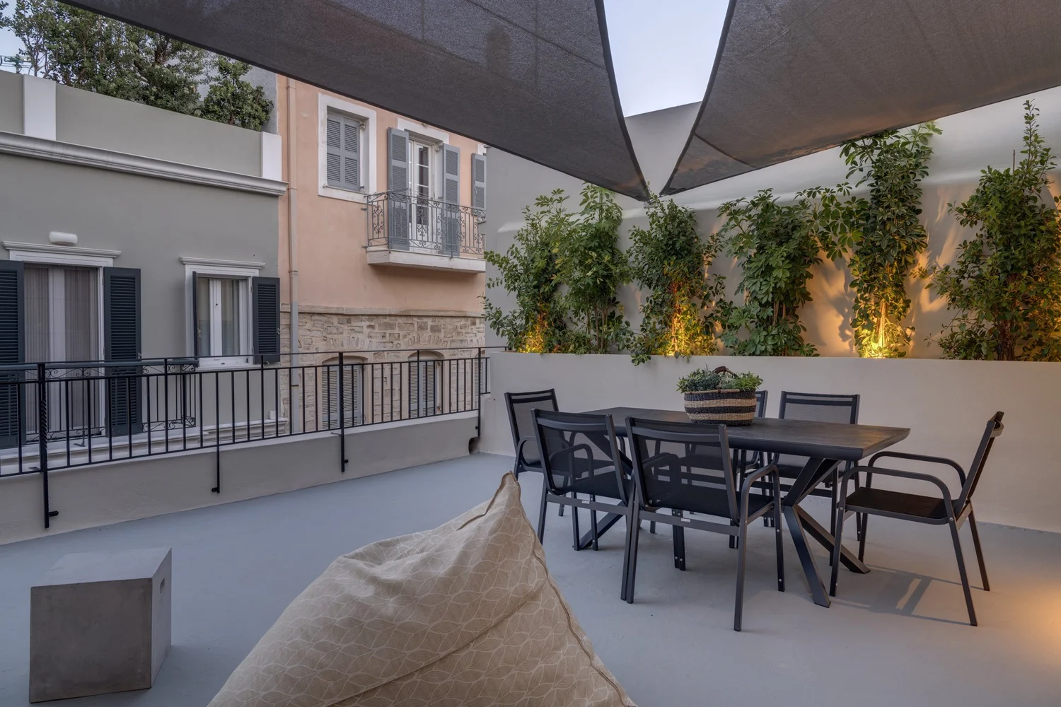 Outdoor dining table in the sheltered lower terrace