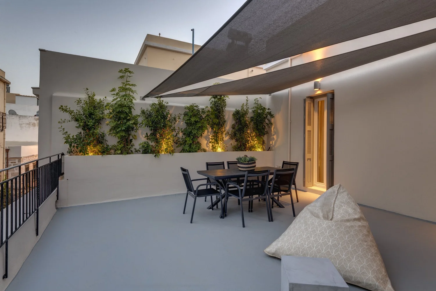 Green corner of the lower terrace patio
